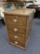 An Edwardian four drawer desk pedestal