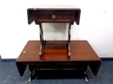 A mahogany sofa coffee table and a sofa end table with brass capped feet
