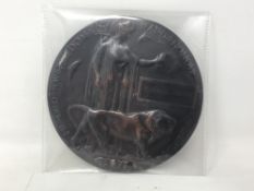 A WWI death plaque named to Charles Smith