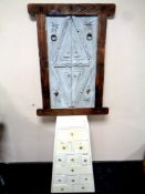 A painted wooden multi drawer chest together with a painted wooden shutter