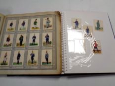 One German volume Uniforms of the Military together with a further album containing German World