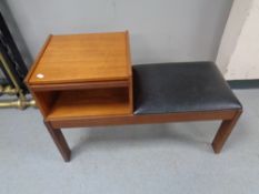 A 20th century teak telephone table