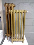 Two antique cast iron floor standing radiators