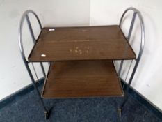 A 20th century melamine and tubular metal tea trolley