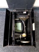 A vintage Tailor Bird manual sewing machine in case