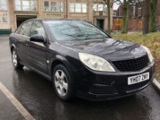 A Vauxhall Vectra five-door hatchback 1800cc petrol motorcar, manual transmission, black,