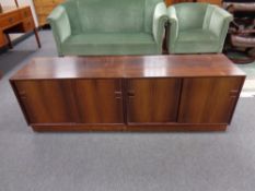 A pair of 20th century Danish Hjernebo double door low cabinets, individual width 85.