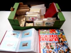 A large box containing cigarette cards to include Kensitas silk flowers, post cards,