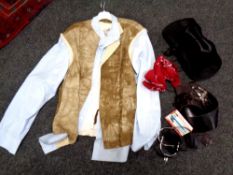 A box containing a cowboy dressing up outfit