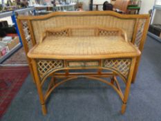 A wicker dressing table fitted a drawer together with a matching 5ft headboard