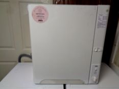 A Zanussi wall mounted slimline dryer