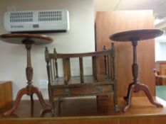 A pair of pedestal wine tables together with a Canterbury in a mahogany finish