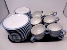 A tray containing twelve Denby Colonial Blue trios