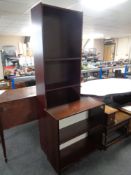 Two sets of contemporary open bookshelves together with a white framed bevel edged hall mirror