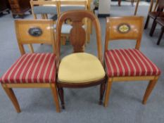 An antique spoon back dining chair together with a further pair of inlaid mahogany continental