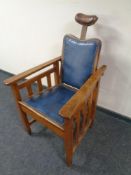 A 1920s oak adjustable barber's chair supplied by The Hairdresser's Salon Fitting Supplies