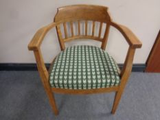 An early 20th century captain's armchair