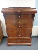 A 19th century mahogany seven drawer chest,