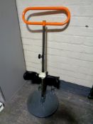 An Etac adjustable rota stand