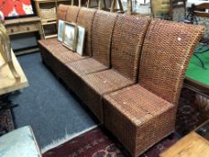 A set of six rattan high backed dining chairs