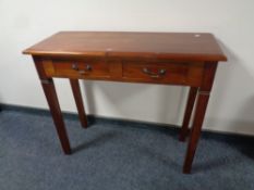 A contemporary Ancient Mariner two drawer console table