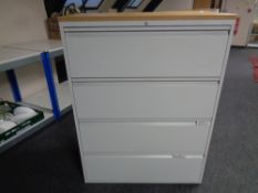 A four drawer metal document cabinet