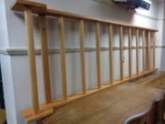 A pine wall mounted rack,