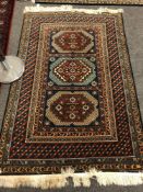 A Caucasian rug of geometric design,