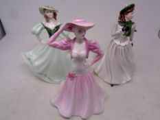 Three Coalport Ladies of Fashion figures; Winter Stroll,
