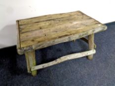 A rustic wooden garden table