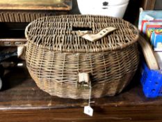 A vintage wicker fishing creel