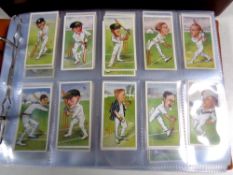 An album of cigarette cards, players, Churchman, National History, Cricket,