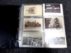 A blue vinyl album of postcards - Newcastle and surrounding areas