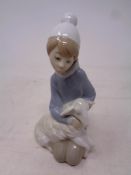 A Lladro figure Shepherd boy with lamb