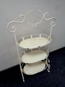 A metal oversized cake stand