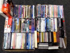 Two boxes of DVD's, box sets and CD's relating to war and Royal Family,