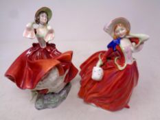 Two Royal Doulton figures;
