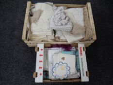 A box and a crate containing a large quantity of assorted table linen