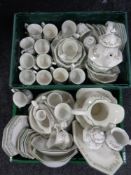 Two crates containing an extensive Johnson Brothers Eternal Beau tea and dinner service