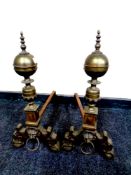 A pair of 19th century lion mask brass fire dogs,