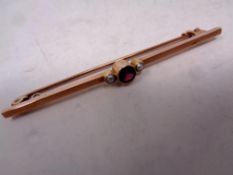 A garnet and pearl set vintage brooch
