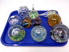 A tray containing ten assorted paperweights to include Selkirk glass,