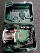 A Bosch POF 1400 Ace router in case