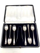 A set of six cased silver teaspoons and tongs, Sheffield marks CONDITION REPORT: 77.
