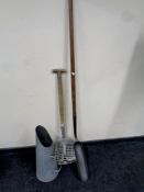 A galvanized coal scuttle together with a vintage long handled scoop and a shovel