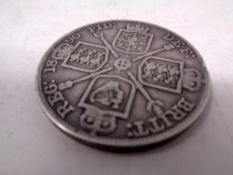 A Victorian silver double Florin dated 1890.