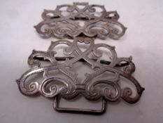 A silver belt buckle