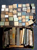 Two boxes containing a large quantity of pianola rolls