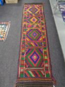 A Suzni kilim runner,