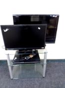 A Toshiba Regza 26'' LCD TV with remote together with a Technika 23.